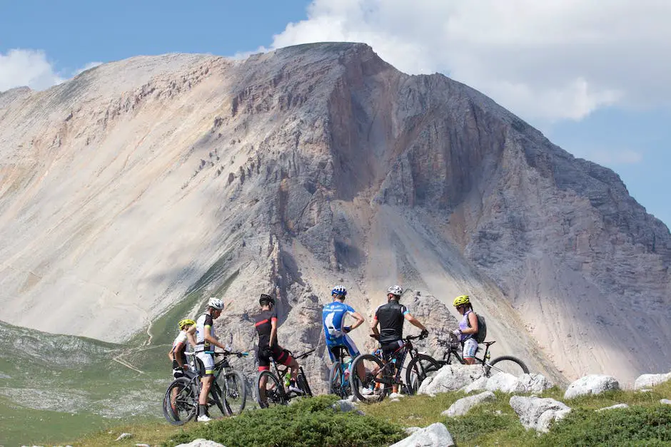 A group of mountain bikers riding on a trail with beautiful scenery