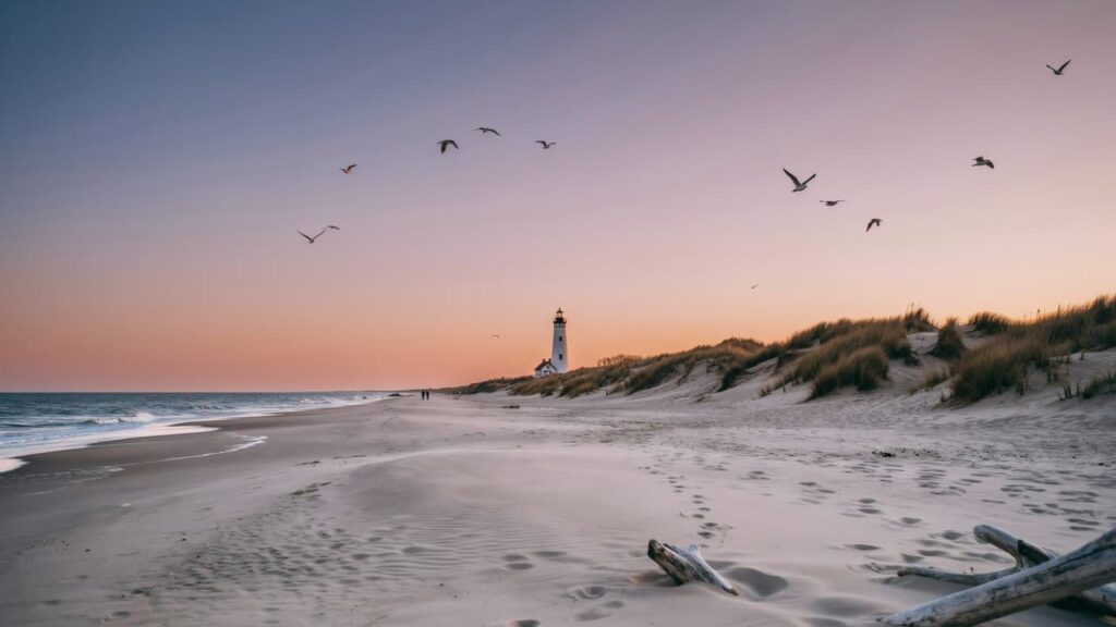 Lighthouse and sand dunes on the West Michigan Lake Michigan shoreline at sunset